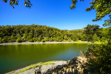 Obraz premium View of the Edersee and the surrounding nature at the lake. Landscape in the Edertal.
