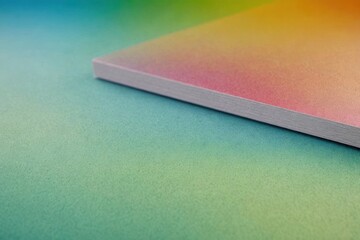 Fototapeta premium honeydew colorful gradient background. Full framed close up flat lay uniform cardboard texture.