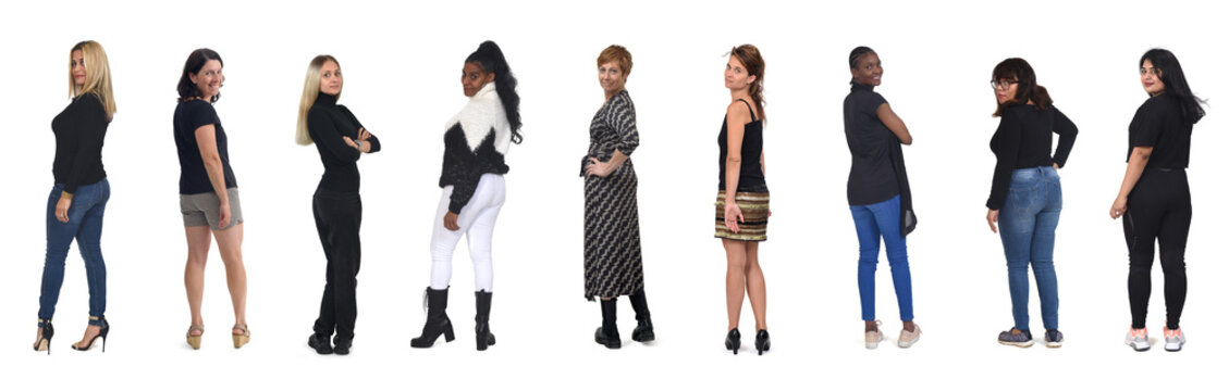 group of women turning and looking at the camera on white background