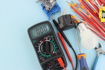 A tool for installing equipment in an electrical switchboard. Soft focus. Close-up.