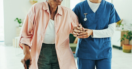 Physiotherapy, holding hands and help with walking stick for support, recovery and guide at hospital. Doctor, cane and person with disability for rehabilitation, steps and care at wellness clinic