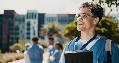 Happy man, vision and nurse with tablet for internship, med school or healthcare campaign at campus. Male person, medical student or junior with smile on technology for dream, research or study