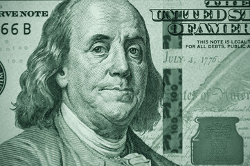 Close-up of part of a hundred dollar bill. Fragment of old 100 dollar bill