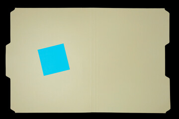manila file folder with blue sticky note on black background