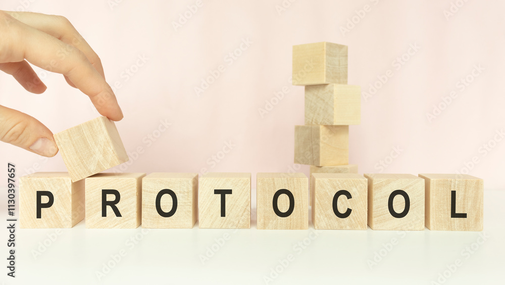 Poster protocol word in wooden cube on a light background