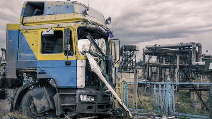 Fototapeta premium damaged and looted cars in a city in Ukraine