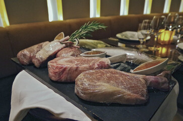 Formal and elegant Art Deco steak house dining room restaurant onboard luxury cruiseship or cruise...