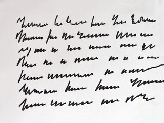 A collection of abstract handwritten notes featuring flowing lines and expressive calligraphy on a simple white surface