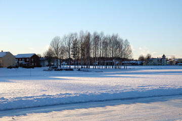 Winter landscape in Mora, Dalarna with snow-covered fields and trees