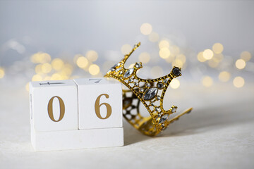 Happy Epiphany day, three kings day. Calendar with king crown on white background