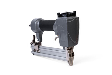 Pneumatic nail stapler isolated on white background.