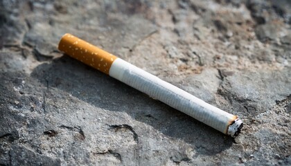 コンクリートのテーブルの上に置かれて近場で上から撮られたたばこ