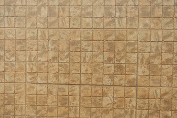 Texture of stone like beige embossed ceramic tiles