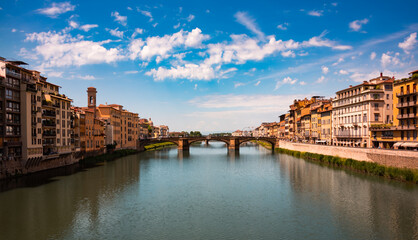 Fototapeta premium Panoramic view of river and bridge in Florence city, Italy