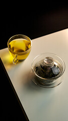 Beautifully arranged tea and dessert on a minimalist styled table for a soothing experience