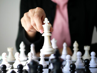 Businesswoman with chessboard for business strategy, leadership or strategic planning, business...