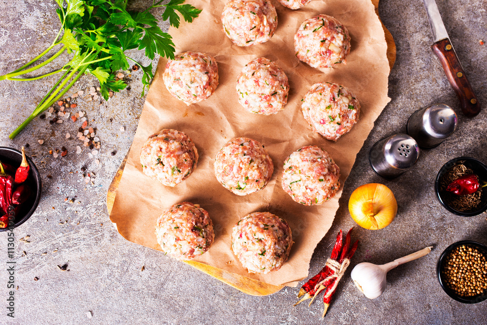 Canvas Prints Raw meatball over beton ready for cooking