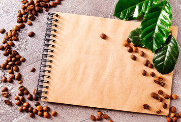 Roasted coffee beans with note on a table