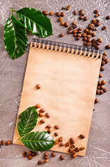 Roasted coffee beans with note on a table