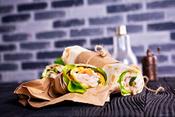 Shawarma sandwich, fresh roll of lavash (pita bread) pork shawarma with ham and cheese