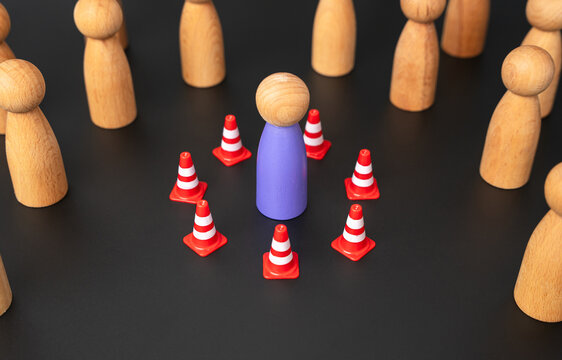 The man isolated himself from others with a barrier. Personal space, comfort zone. Psychological trauma and protective reflexes. Reluctance to start new relationships and acquaintances.