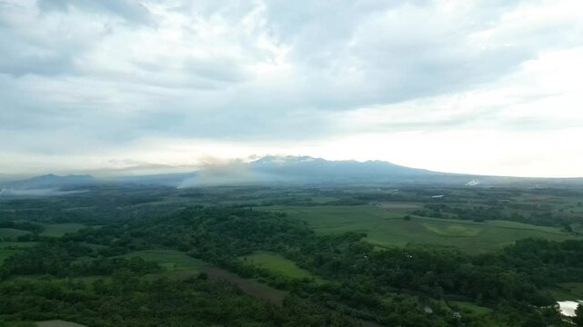 Beautiful rising shot of green scenery and mountains in Bacolod Philippines.