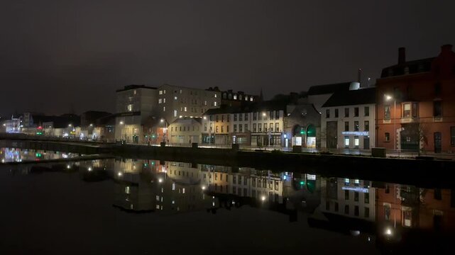 Quiet night along River Lee in Cork, Ireland from Brian Boru Bridge