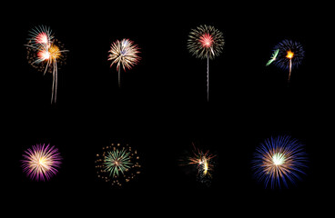 Variety of colorful fireworks isolated on black background