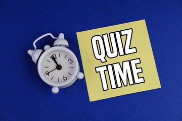 The words Quiz on color wooden blocks. the concept of answering quizzes or quiz games
