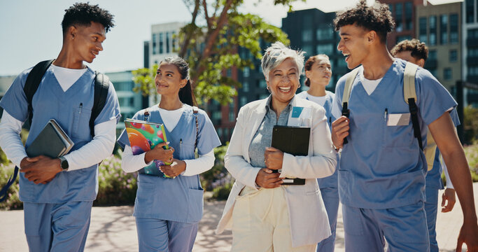 Medical student, happy and professor with people in outdoor for college, healthcare and teacher. Scholarship, internship and doctors with students on hospital campus for assignment and education