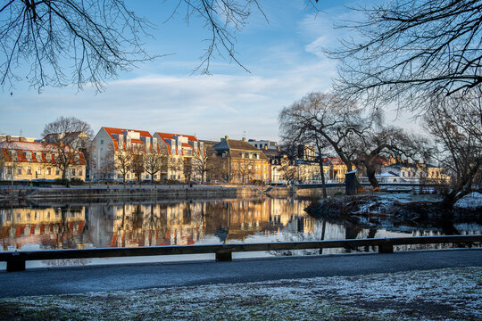 Norrk&ouml;ping waterfront Salt&auml;ngen and Str&ouml;msholmen islet in Motala Stream during December 2024. Norrk&ouml;ping is a historic industrial town in Sweden.