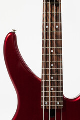 Closeup photo of a white bass guitar