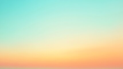 A blurred ombre background in shades of blue, green, yellow, and orange.