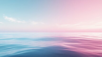 Obraz premium A soft, pastel pink and blue sky over calm ocean water.
