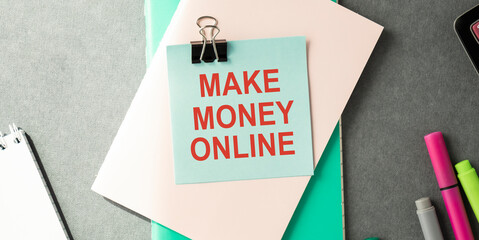 Paper sheet with inscription Make money on-line on grey background