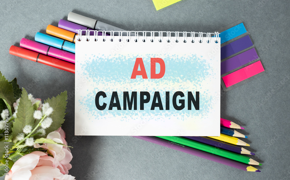 Poster notebook with toolls and notes about ad campaign