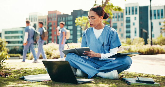 Woman, nurse or student writing with book for internship, studying or research at med school. Female person, healthcare candidate or intern taking notes with laptop for medical exam or test at campus - Powered by Adobe