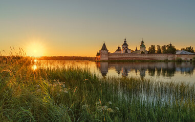 The ensemble of the Kirillo-Belozersky monastery in the Vologda region in Russia at sunset in the...