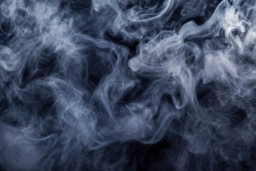 Obraz premium Dense swirling smoke patterns against a dark background
