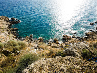 Vertical view. View of rocky coastline. Antalya cliffs, Taurus Mountains and Mediterranean Sea,...