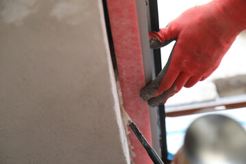 installation of a remote window in the warm contour of the building, foaming
