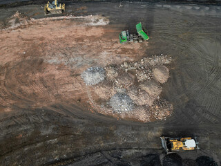 preparation of the construction site, leveling of soil and rubble from the previous building that...