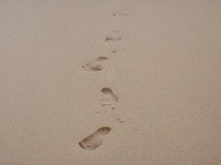 footprints on the beach