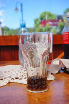 Glass of Coca Cola on a table