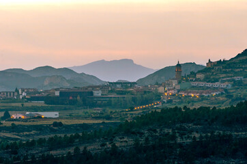 Fototapeta premium Bastida village (Spain) among the mountains in a summer evening