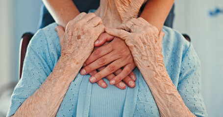Holding hands, kindness and hug with old person in living room for healthcare, caregiver or...