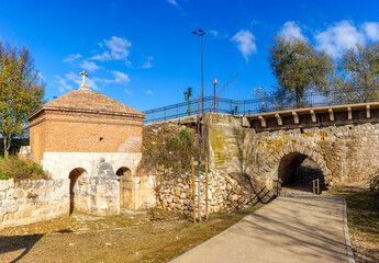 Restored 18th-century water gatehouse near the Henares River, showcasing historic hydraulic...