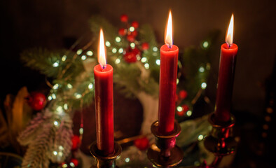 Rite with a burning candle, night mystery atmosphere, Christmas eve, Yule or another day