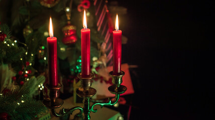 Rite with a burning candle, night mystery atmosphere, Christmas eve, Yule or another day