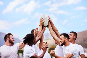 Men, success and rugby ball for team, outdoor and celebration in exercise, wellness and fitness. Male people, athlete and recreation facility as group for match, sport and victory in stadium or arena